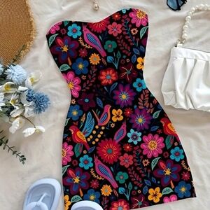 Did someone say island time!!! Adorable Mini bright, strapless vacation dress.